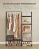 A multi-functional clothing rack with shelves, displaying clothes, hats, boxes, and shoes. Produktbild-Vorschau