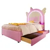 A pink children's bed with a unicorn-themed headboard and built-in storage drawers. Podgląd zdjęcia produktu
