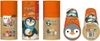 Multiple views of a cylindrical product package for a sewing kit, featuring a penguin design. Anteprima dell’immagine prodotto