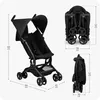 A product image showing a black baby stroller with dimensions indicated by measurement lines and text. Produktbild-Vorschau