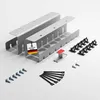 A set of cable management accessories, including two cable channels, screws, and cable clips, laid out on a white background. Produktbild-Vorschau