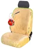 A beige sheepskin car seat cover with a black headrest, shown from the front. Produktbild-Vorschau