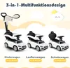 Three white toy cars with black seats and steering wheels are displayed side-by-side, each representing a different stage of use for a child. The first car has a push handle and a protective bar, the second has a seat and steering wheel, and the third is s Produktbild-Vorschau