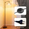 A floor lamp with a woven shade is shown, along with close-ups of its foot switch and plug. Podgląd zdjęcia produktu