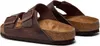A pair of brown Birkenstock sandals shown from a side-angle. Anteprima dell’immagine prodotto