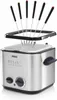 A stainless steel mini deep fryer and fondue pot with six fondue forks resting on top. Produktbild-Vorschau