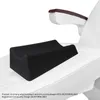A black footrest is placed on a white chair. Anteprima dell’immagine prodotto