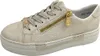 A single beige sneaker with gold accents is shown from a side-diagonal view against a white background. Náhled obrázku produktu