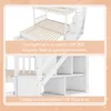 A close-up view of a white bunk bed, highlighting its extendable feature and storage stairs. Náhľad obrázku produktu