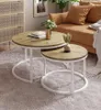 A living room setting with a couch, rug, and nesting coffee tables. Náhľad obrázku produktu
