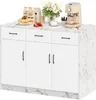 A kitchen island with a marble countertop, featuring a coffee maker, pancakes, and other kitchen items. Voir les images du produit