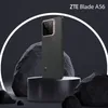 A ZTE Blade A56 smartphone is displayed on a pedestal, surrounded by rocks and a white circular light. Produktbild-Vorschau