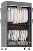 A portable closet with clothes hanging inside. Voir les images du produit