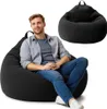 A man is sitting on a black beanbag chair, with another black beanbag chair shown in the background. Voir les images du produit