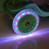Close-up of a child's scooter wheel with colorful LED lights. Podgląd zdjęcia produktu