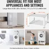 A collage showing a washing machine stand in different settings, including a kitchen with a refrigerator, a laundry room with a washing machine, and a person using a dryer. Voir les images du produit