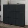 A dark gray shoe cabinet with nine compartments is shown against a light gray wall and a wooden floor. Produktbild-Vorschau