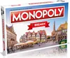 A Monopoly board game box featuring a cityscape of Bremen, Germany. Produktbild-Vorschau