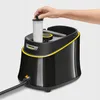 A hand is inserting a filter into a black and yellow steam cleaner. Podgląd zdjęcia produktu