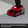 Close-up of a power tool battery with an LED light and a text overlay. Produktbild-Vorschau