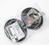 Two black ear pads are packaged in clear plastic bags, with labels attached. Náhľad obrázku produktu