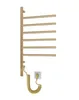 A gold electric towel warmer with a coiled power cord plugged into a wall socket. Podgląd zdjęcia produktu