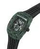 A close-up, angled shot of a green and black Guess watch against a white background. Anteprima dell’immagine prodotto