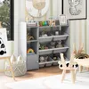 A children's playroom with a toy storage unit, toys, and decorations. Podgląd zdjęcia produktu