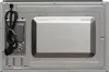 The back of a microwave oven, showing the power cord and ventilation grille. Produktbild-Vorschau