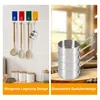 A split image showing kitchen utensils hanging on hooks on the left and a stack of saucepans on the right. Produktbild-Vorschau