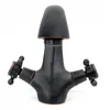 A product shot of a black and bronze faucet. Anteprima dell’immagine prodotto