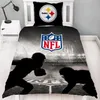 A bed with NFL Pittsburgh Steelers bedding and a pillow. Produktbild-Vorschau