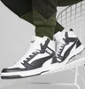 A pair of Puma sneakers on a white rack. Náhled obrázku produktu