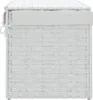 A white woven laundry basket with a fabric liner and tie closure. Voir les images du produit