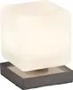 A cube-shaped lamp with a frosted white shade sits on a dark gray square base. Anteprima dell’immagine prodotto