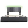 A gray upholstered bed frame with a slatted base and a headboard with vertical channel tufting. A green light emanates from behind the headboard. Anteprima dell’immagine prodotto