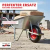 A wheelbarrow filled with bags of cement on a construction site. Produktbild-Vorschau
