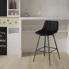 A black bar stool is shown in a modern kitchen setting. Produktbild-Vorschau