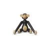 A small wooden monkey toy sitting on a white background. Náhled obrázku produktu