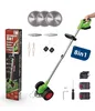 A product shot of a cordless lawn trimmer and its accessories, laid out on a white background. Produktbild-Vorschau