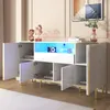 A white high-gloss sideboard with gold trim and legs, featuring open doors and interior LED lighting. Produktbild-Vorschau