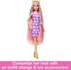 A Barbie doll with long, colorful hair and a cat-print dress, standing against a white background. Anteprima dell’immagine prodotto