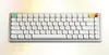 A white mechanical keyboard with colorful keycaps on a gradient background. Produktbild-Vorschau