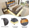 A bedroom scene featuring a modern upholstered bed with LED lighting, a nightstand, and a view of a house and garden through a large window. Produktbild-Vorschau