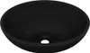 A black oval ceramic sink with a drain hole in the center. Náhled obrázku produktu