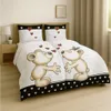 A bedroom scene with two beds featuring bedding with a heart design and cartoon bears. Produktbild-Vorschau