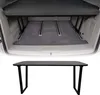 A product image showing a car interior with a bed extension and a separate image of a table. Voir les images du produit