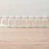 Set di 7 bottiglie in vetro da 50 ml con tappo – Mini Anteprima dell’immagine prodotto 3