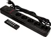 A black power strip with multiple outlets and a remote control. Produktbild-Vorschau