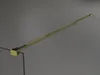 A close-up, angled view of a gold-colored shower wall bracket against a plain gray background. Produktbild-Vorschau